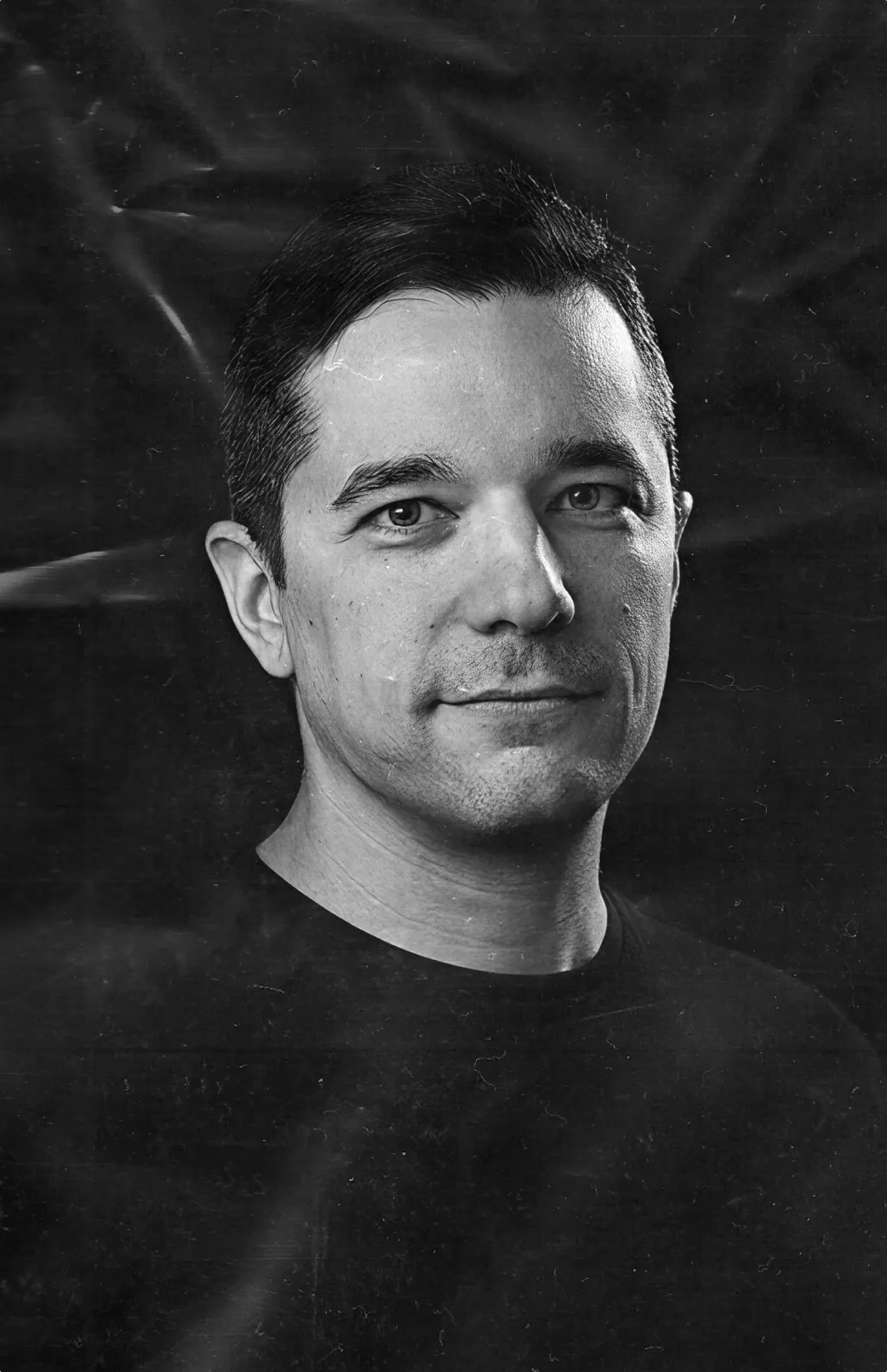 Team member headshot in black and white