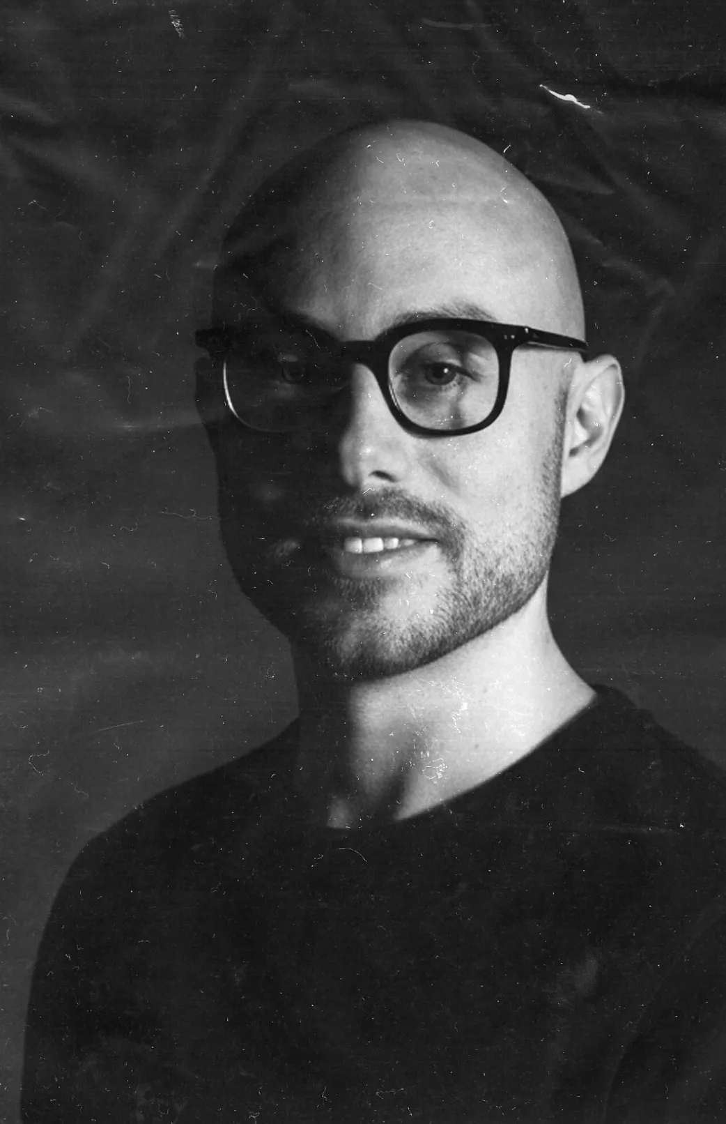 Team member headshot in black and white