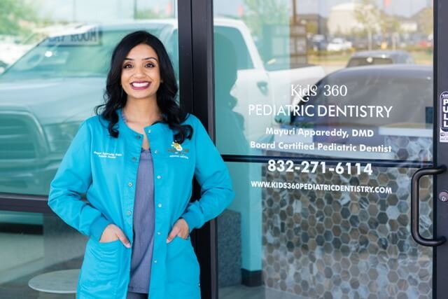 Smiling child during a dental checkup at Kids 360 Pediatric Dentistry, trusted pediatric dentist in Richmond