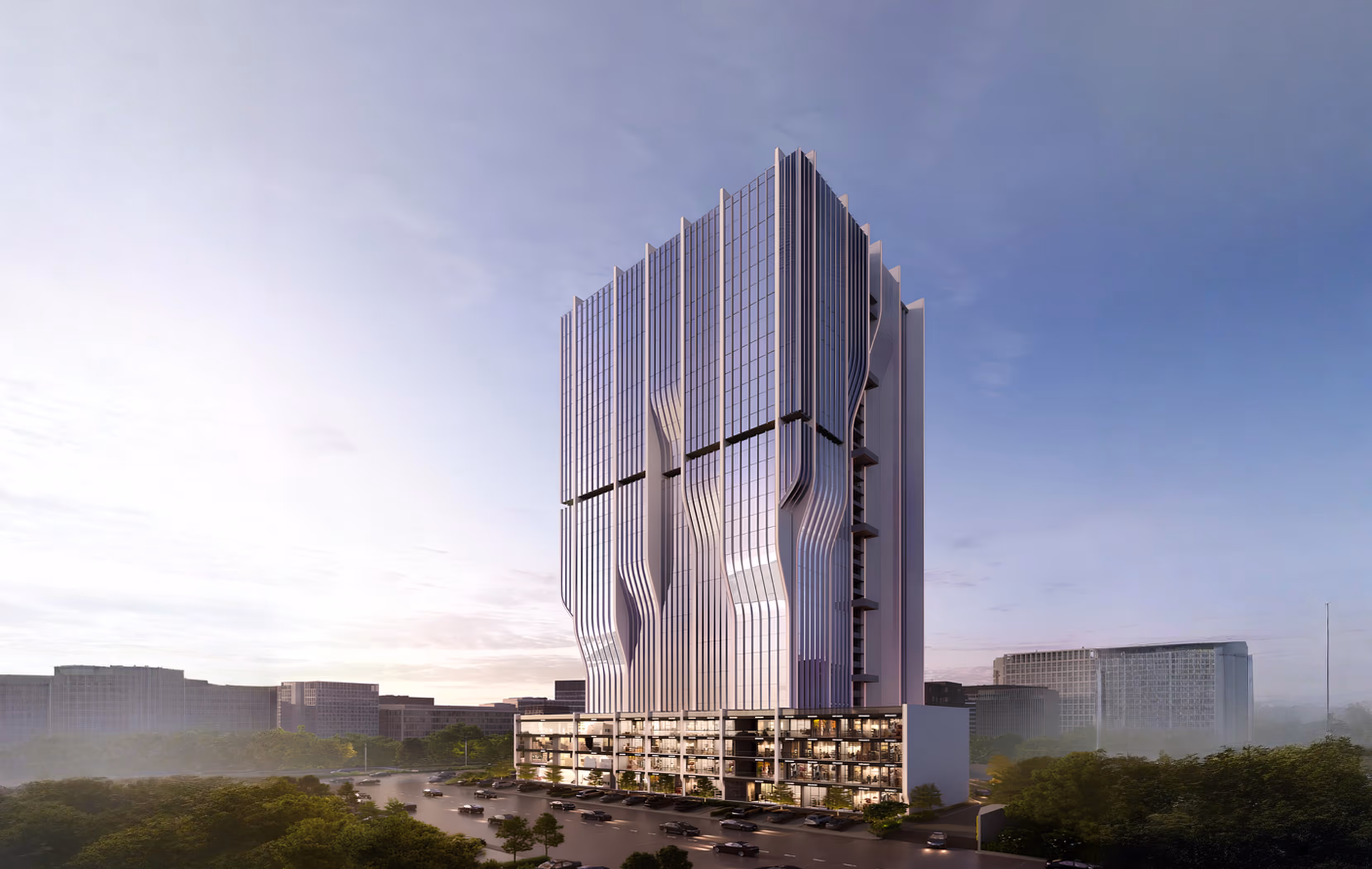 Modern glass skyscraper with a wavy facade design surrounded by trees and city buildings under a cloudy sky.