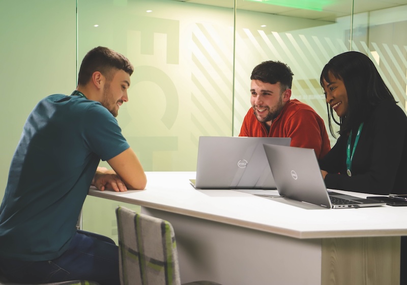 ASDA employees having a meeting in the office.