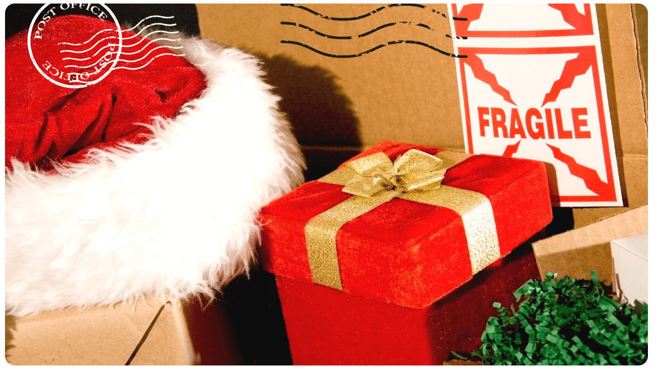 Various Christmas decorations and package boxes, with a post office stamp in the left-top corner.
