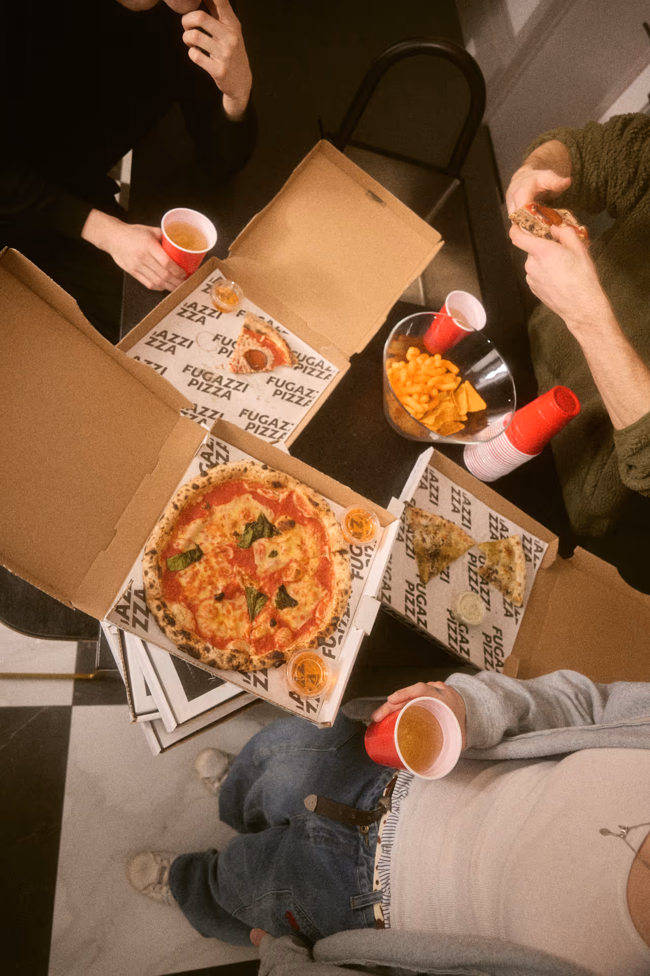 A wooden walkway leading to a building with a wooden deck.