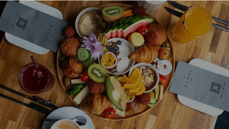 A table with assorted foods on it.