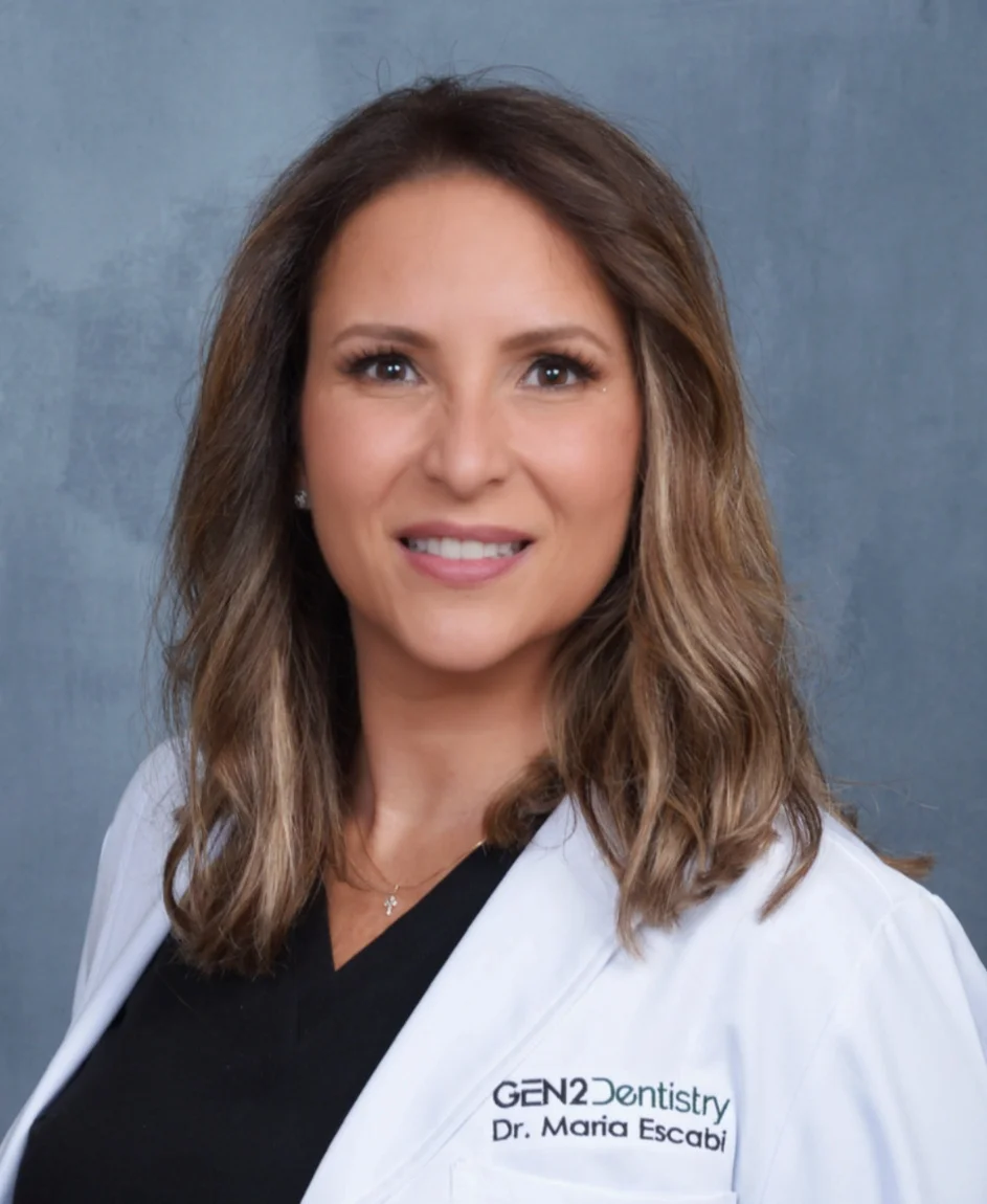 A woman in a white lab coat.