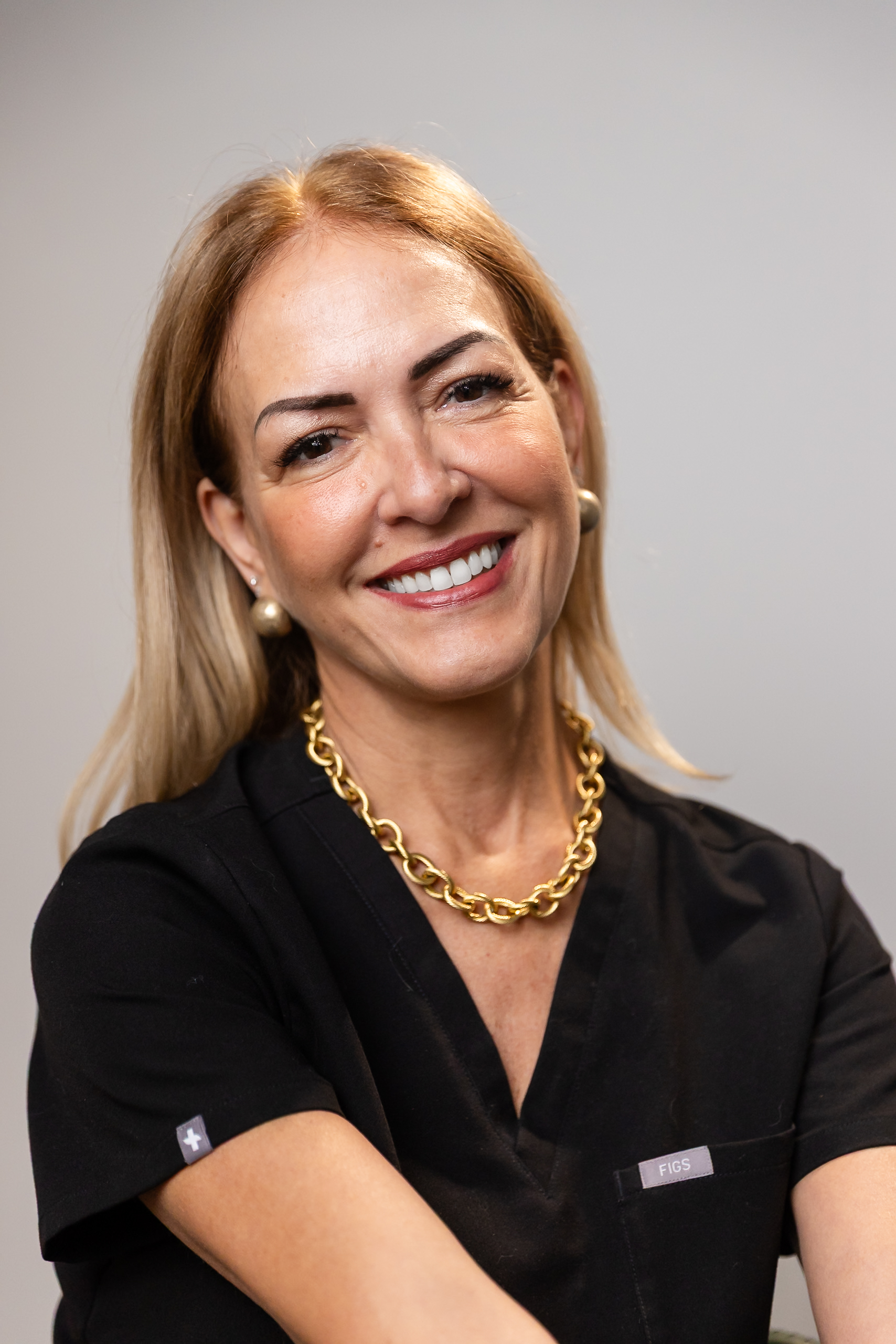 Viviana, office manager at Gen2 Dentistry in Davie, Florida.