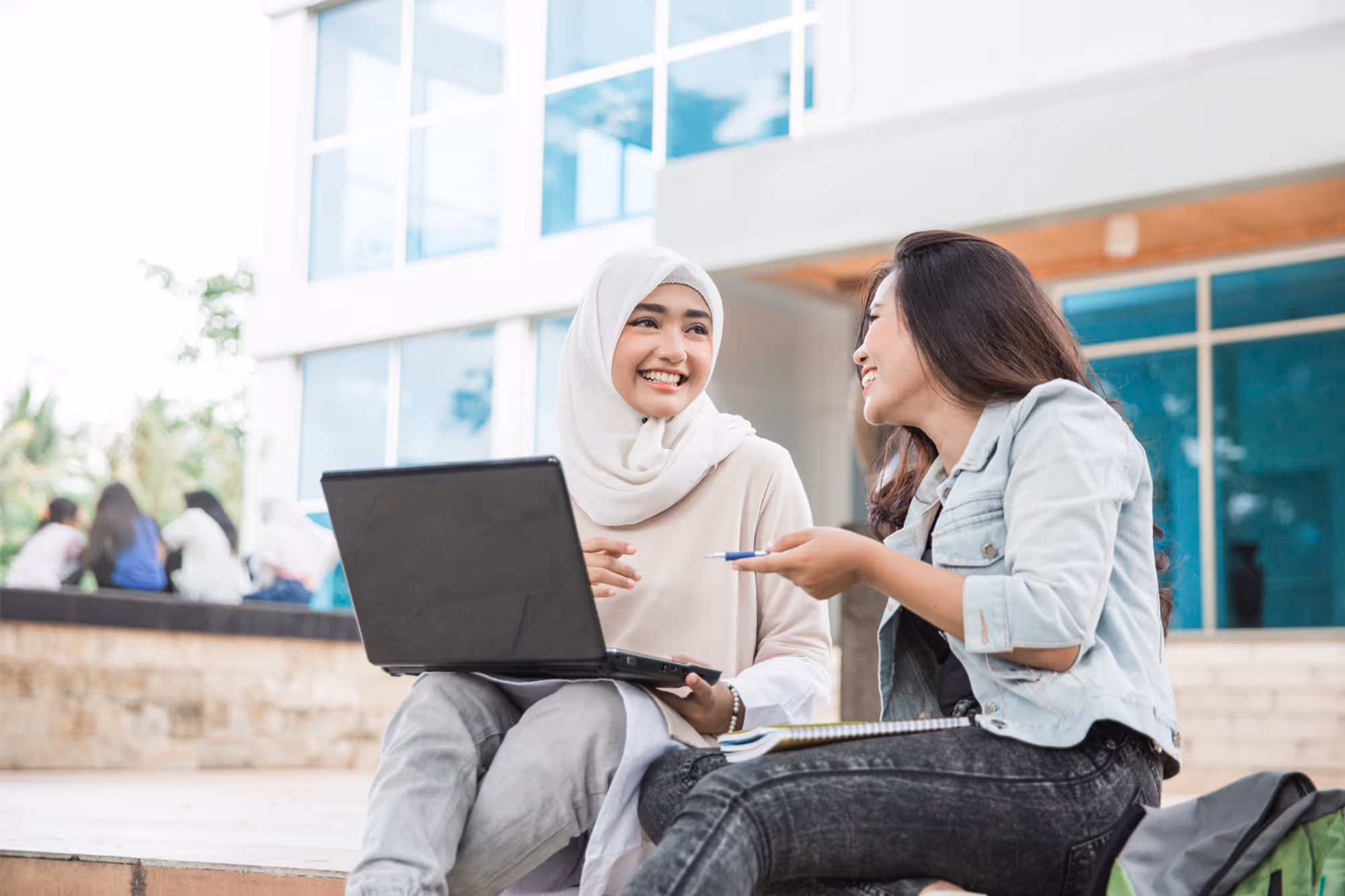 women-working-laptop-outdoors