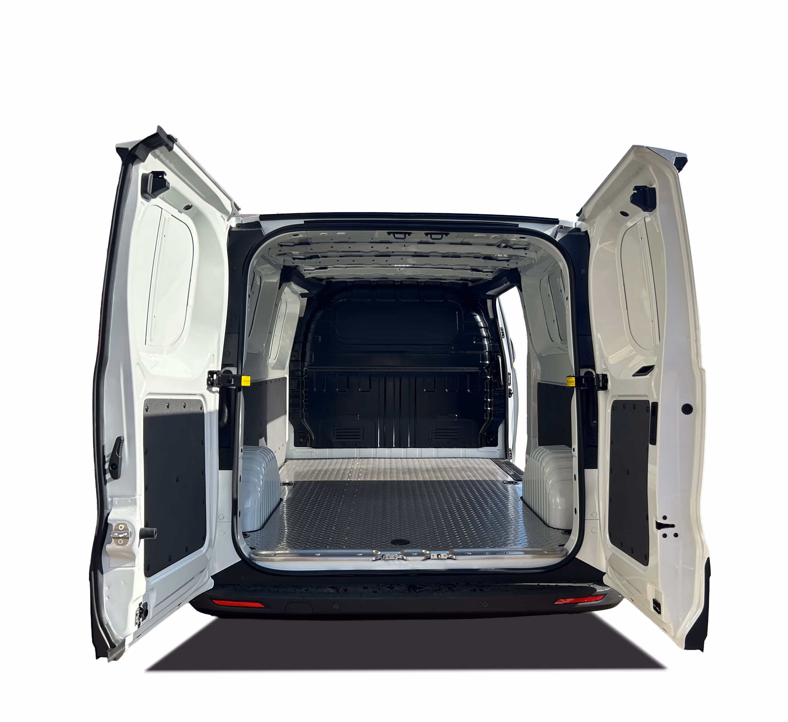 Empty white cargo van with rear doors open showing metal floor and black interior panels.