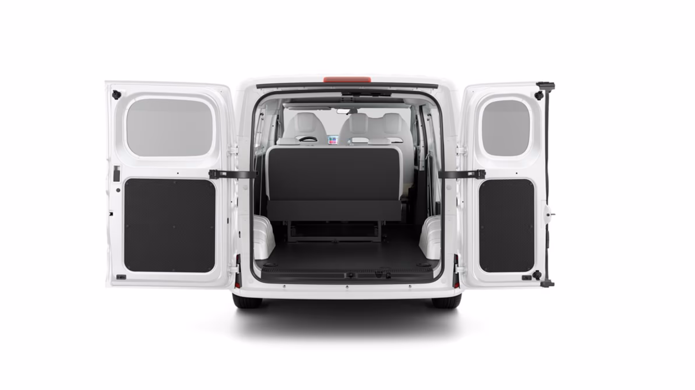 Rear view of a white van with its double doors open, showing empty cargo space and back of two front seats.