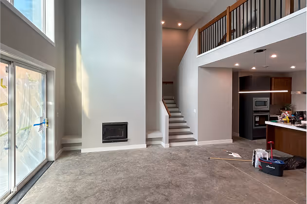 A living room with stairs