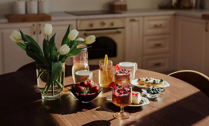 Edges are sharp. The baseboards are bright again. There’s no heavy paint smell (low-VOC), and the drop cloths are gone. Sun’s coming through the window, and the walls look clean instead of “patched.” 