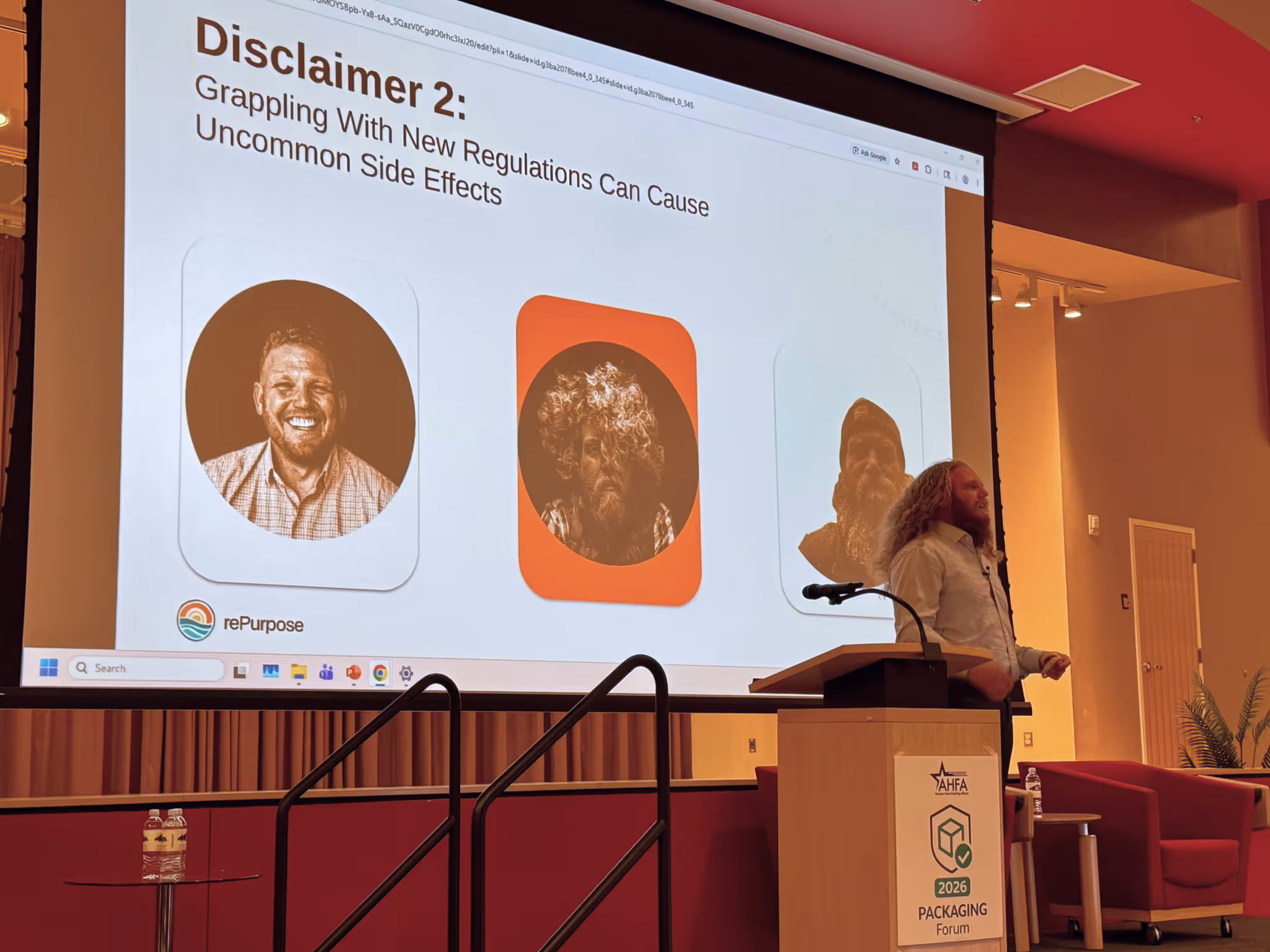 Presenter standing by podium during talk with slide about new regulations causing uncommon side effects.