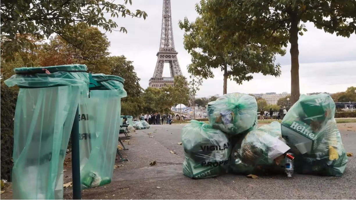 Trash cans in front of the Eiffel Tower in France