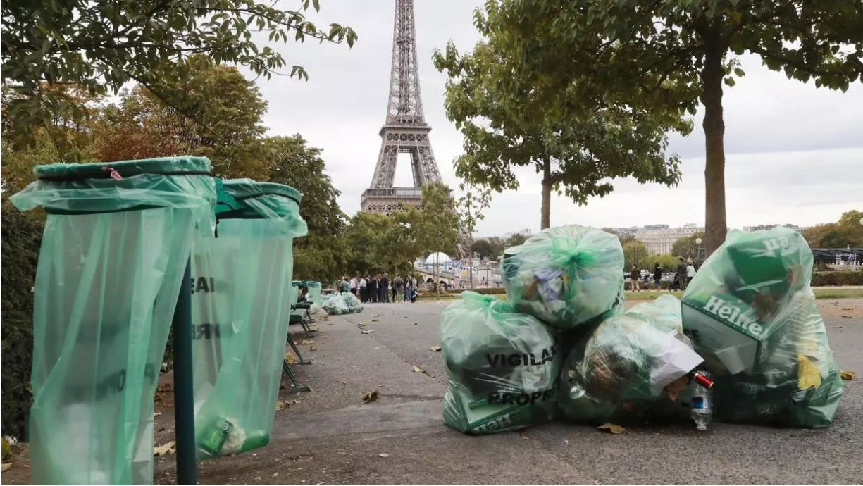 Trash cans in front of the Eiffel Tower in France