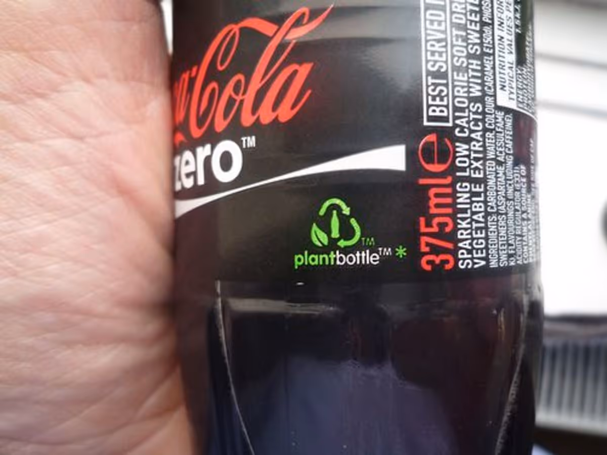 A plastic bottle saying plant bottle as an example of greenwashing