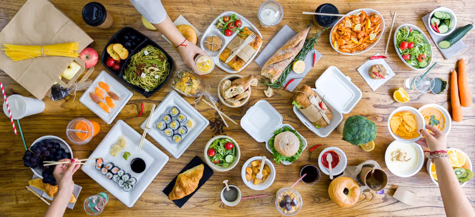 Food in plastic plates and containers