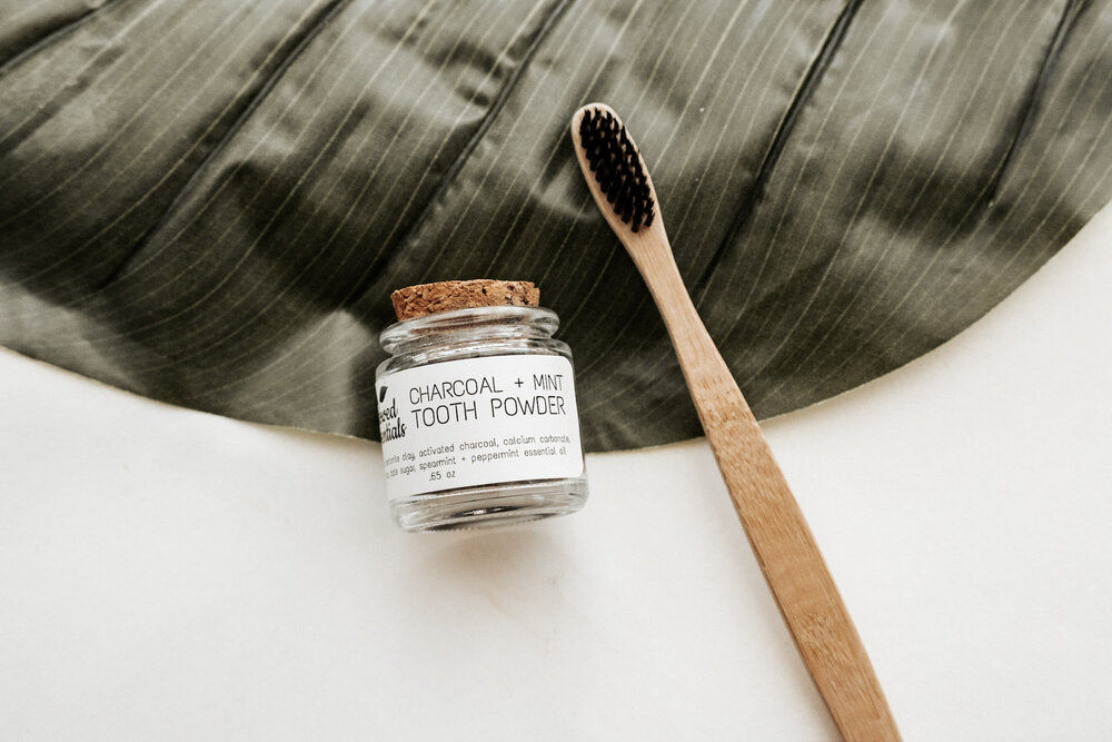 Toothpowder and toothbrush from Bestowed Essentials, one of the most popular zero-waste skincare brands