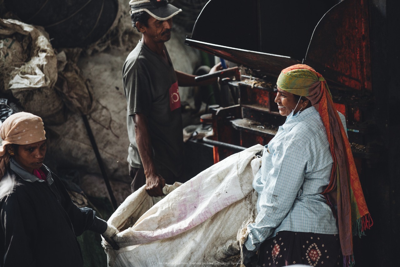 Waste workers at Waste Ventures India, sorting and recycling 
