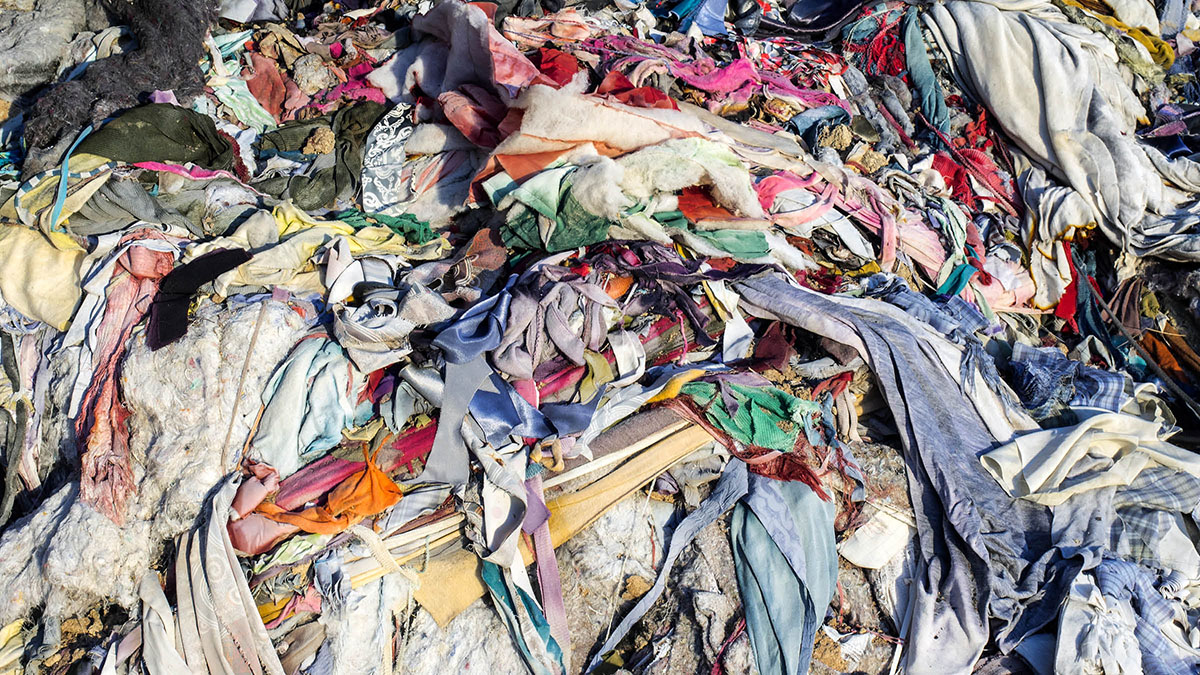 A landfill full of clothes from the fast fashion industry