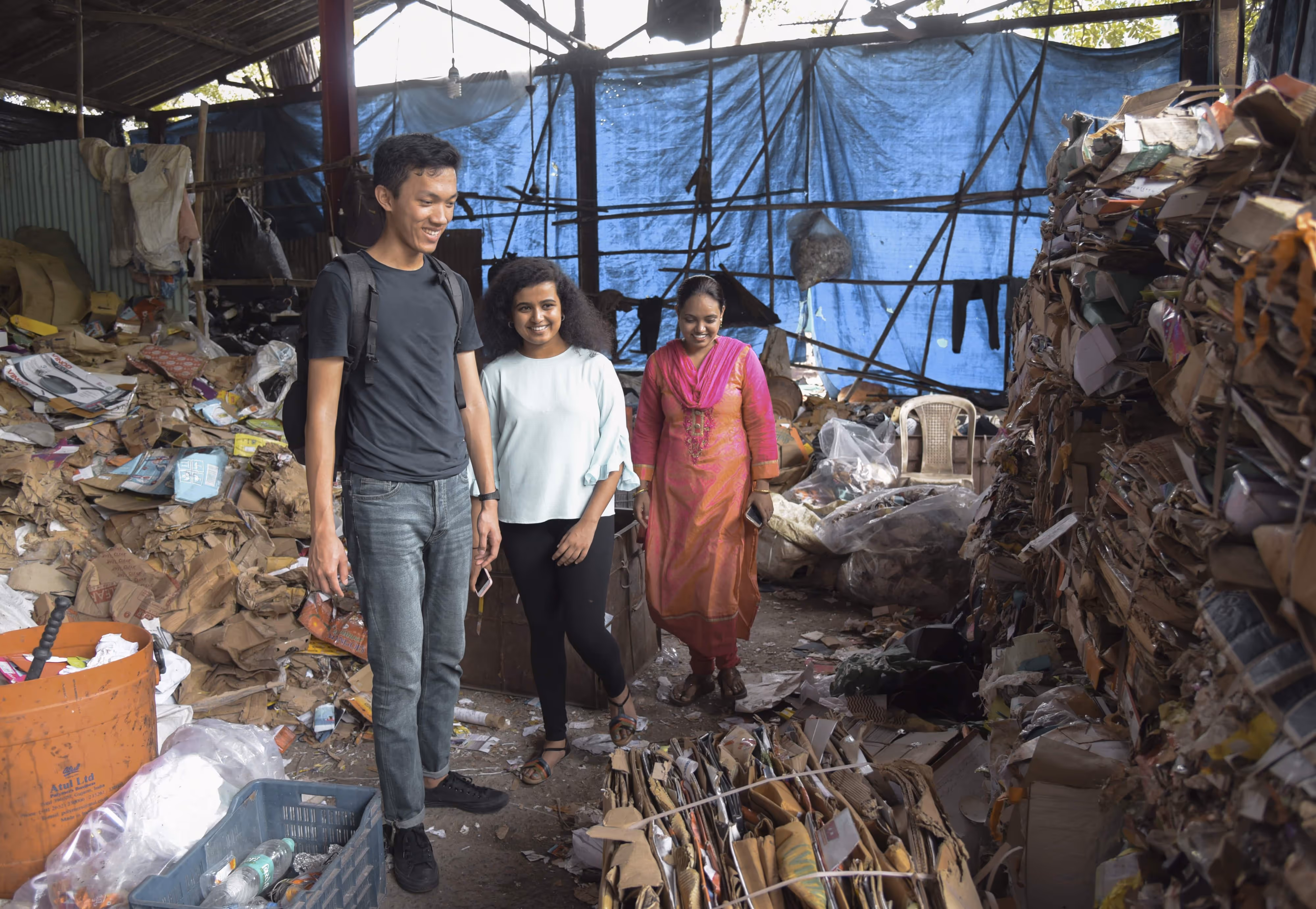 Our co-founders Peter Wang Hjemdahl and Savinka Balasubramanian in a waste recycling enterprise in India