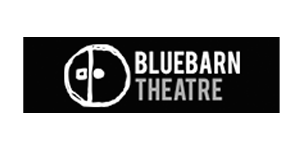 A black rectangular logo with a white circular drawing on the left that resembles a stylized barn door with two dots, and the words "BLUEBARN THEATRE" in uppercase white letters to the right.