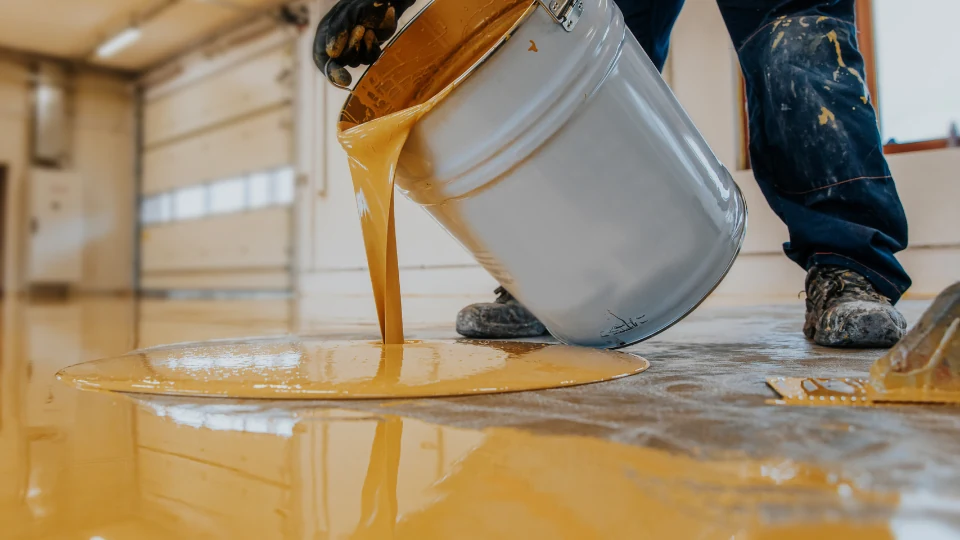Epoxy garage floor with decorative flake system in a residential two-car garage