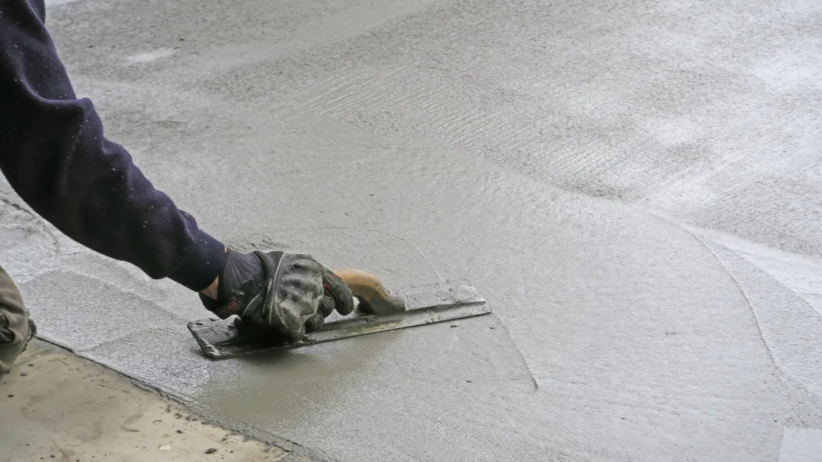 Freshly poured concrete driveway in Oxnard home with smooth broom finish