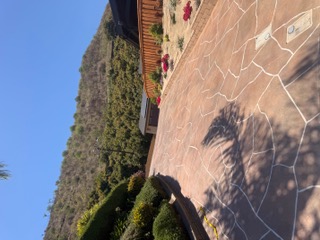 Flagstone-pattern concrete overlay driveway in Santa Barbara