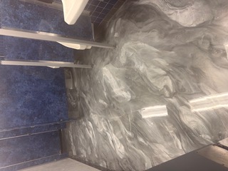Metallic epoxy bathroom floor in Ventura