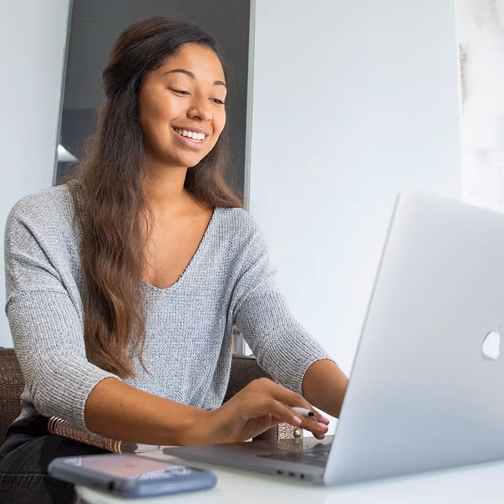 Employee working on a laptop.
