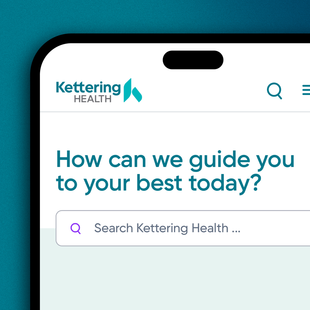 Partial view of a digital device screen showing Kettering Health website header with a search bar and text 'How can we guide you to your best today?'