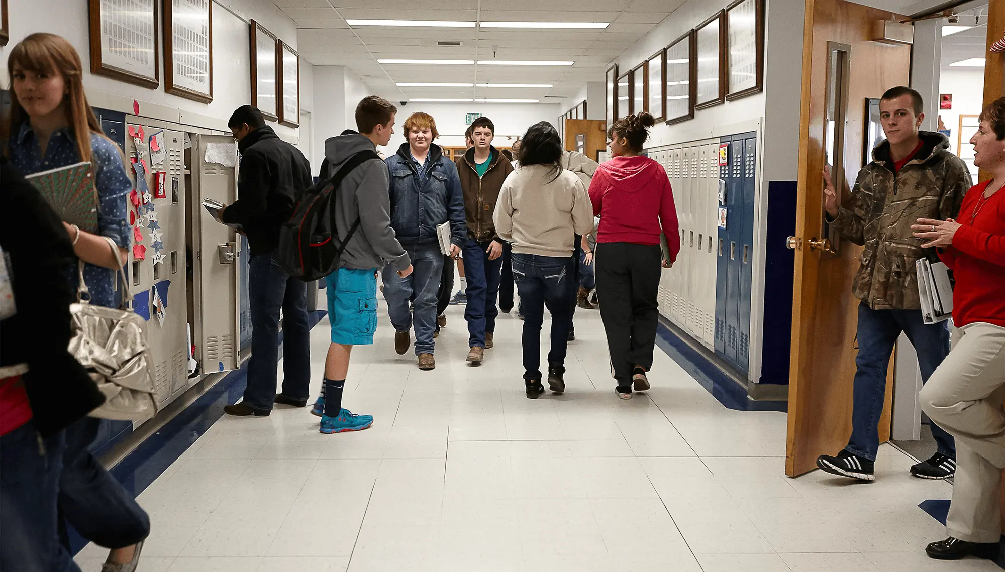 Teens in a school hallway
