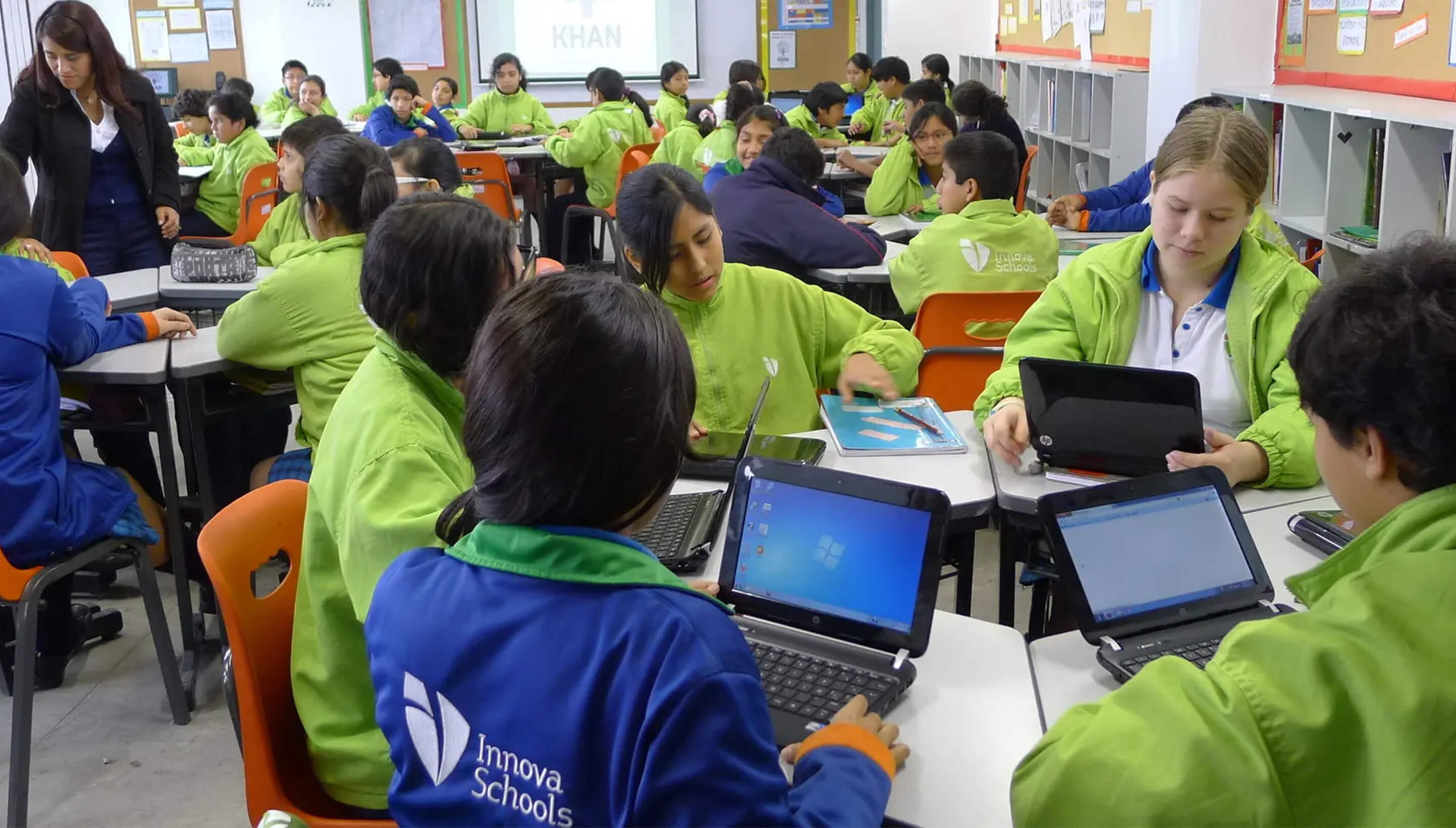 Peruvian children in classroom with laptops