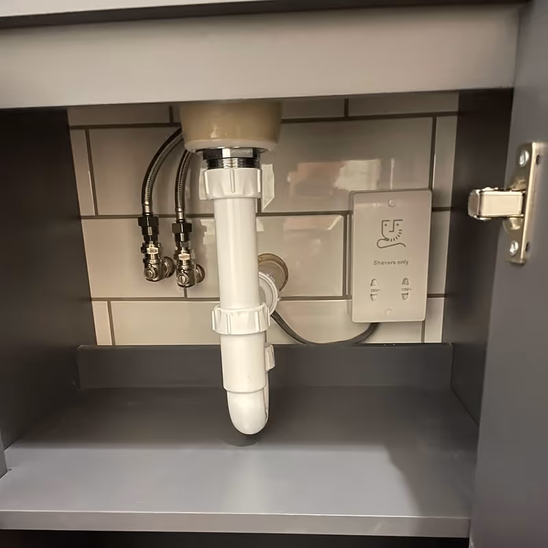 Pipes under a sink