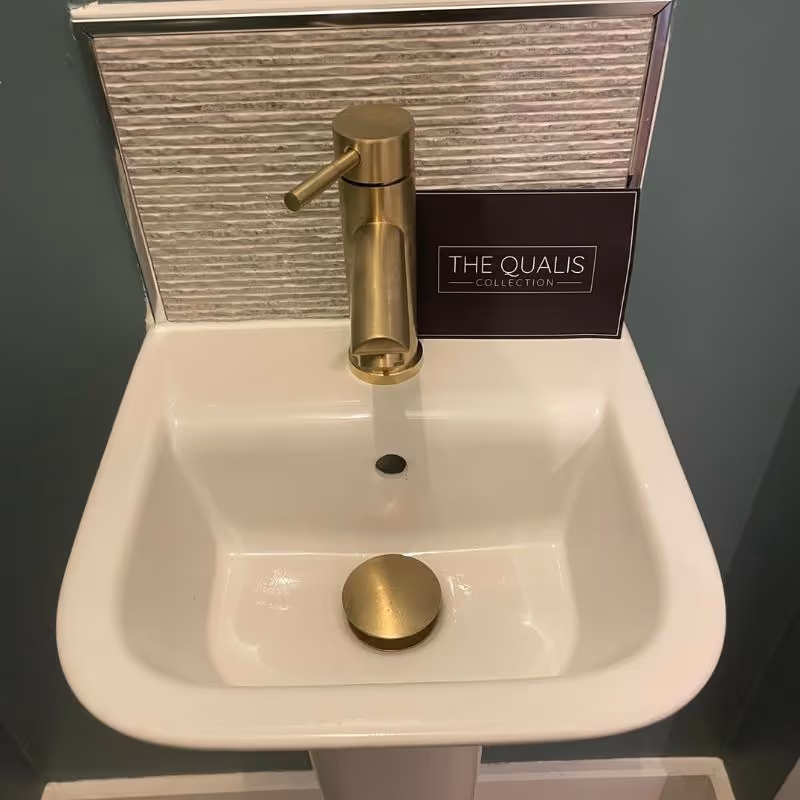 Basin with gold tap