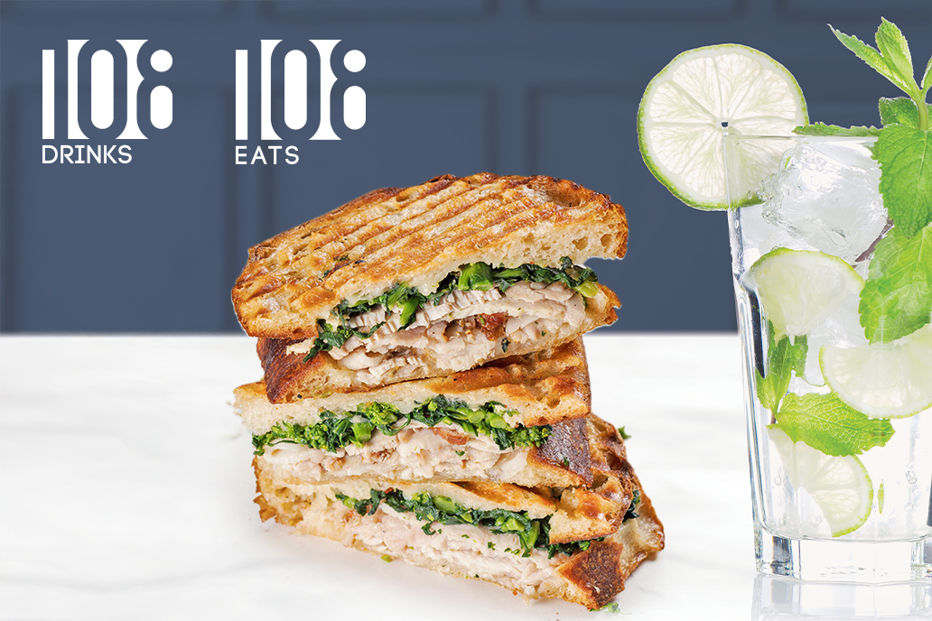 108 Drinks and 108 Eats logo with a panini sandwich and a margarita