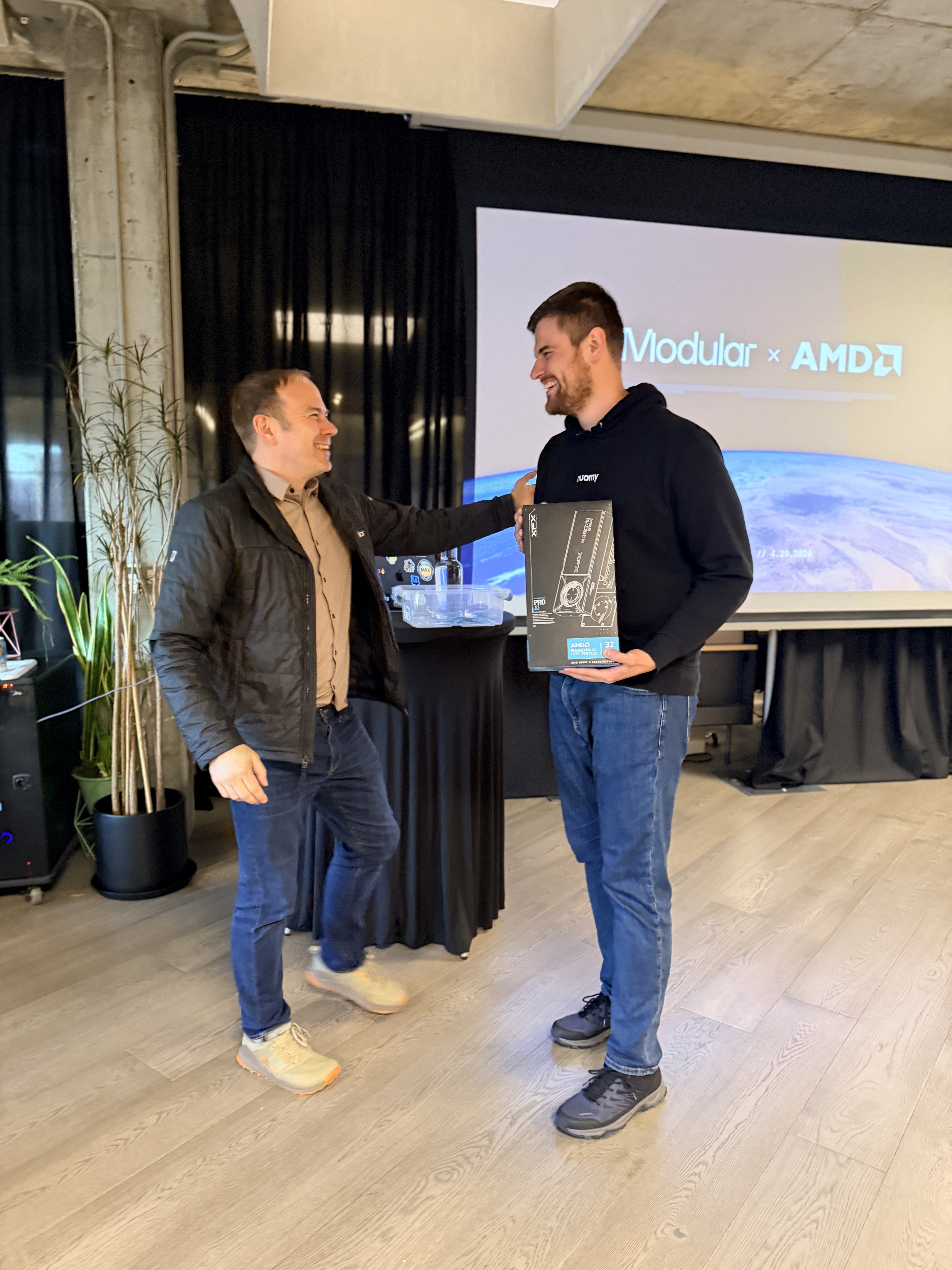 Chris Lattner and Filip Holec, the winner of our raffle for a Radeon graphics card