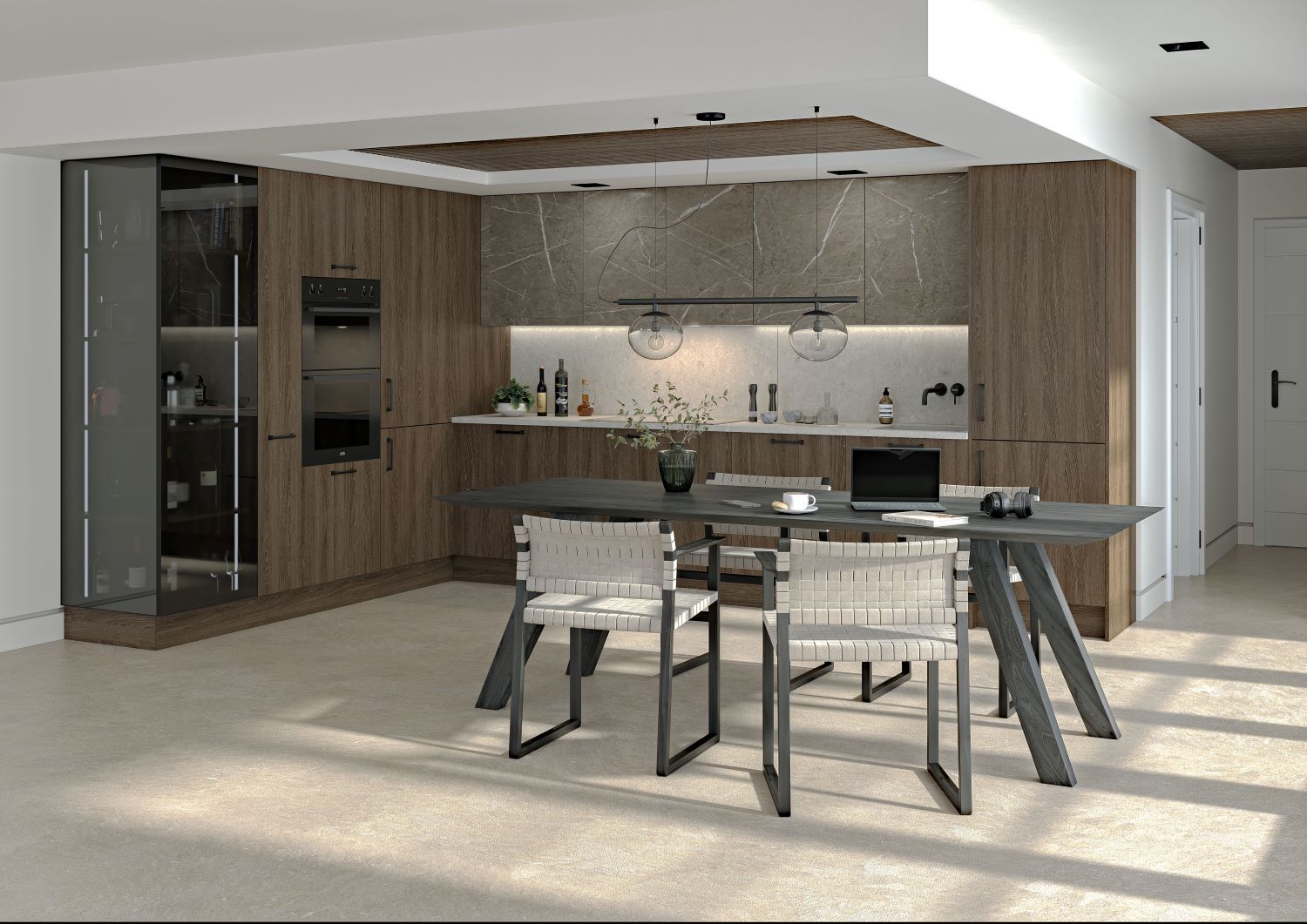 Modern kitchen with wood cabinets, stone backsplash, a dining table with woven chairs, a laptop, and two hanging pendant lights.
