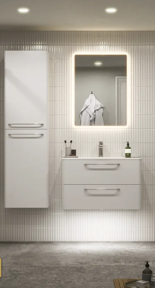 Modern white bathroom vanity with illuminated rectangular mirror, wall-mounted cabinet, and tiled wall.