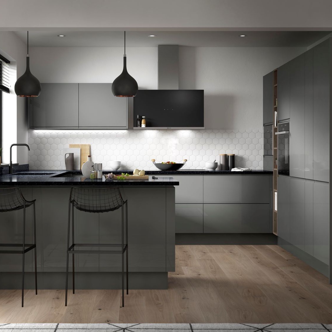 Modern kitchen with matte grey cabinets, black countertops, black pendant lights, and a hexagonal white tile backsplash.