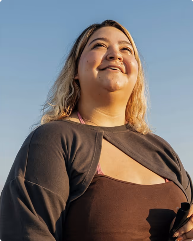 women-smiling-looking-to-the-sky-mobile