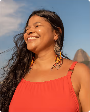 Women in red smiling