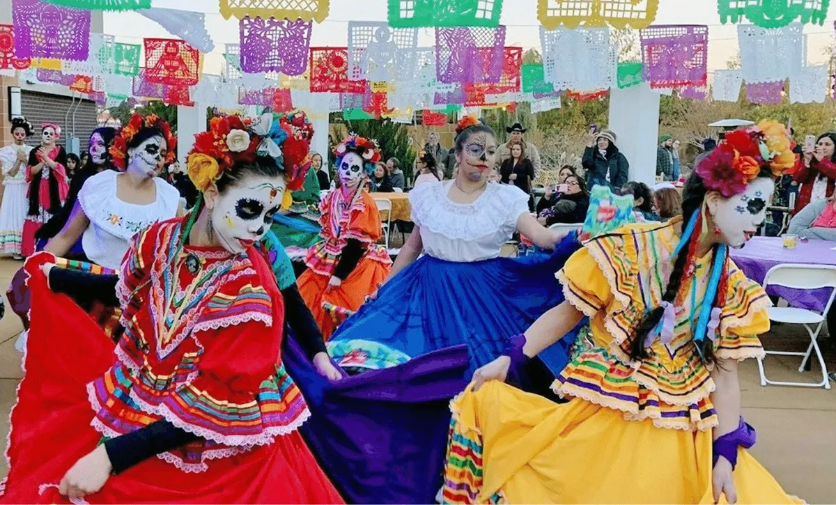 A group of dancers, performing a traditional Mexican dance.