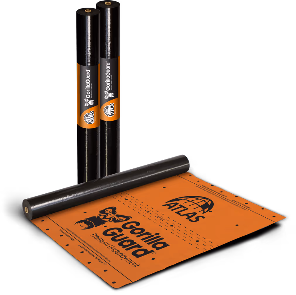 Two black rolls of Gorilla Guard premium underlayment and one partially unrolled orange sheet with Gorilla Guard and Atlas logos.