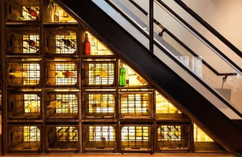 Back lit storage underneath a modern stair case