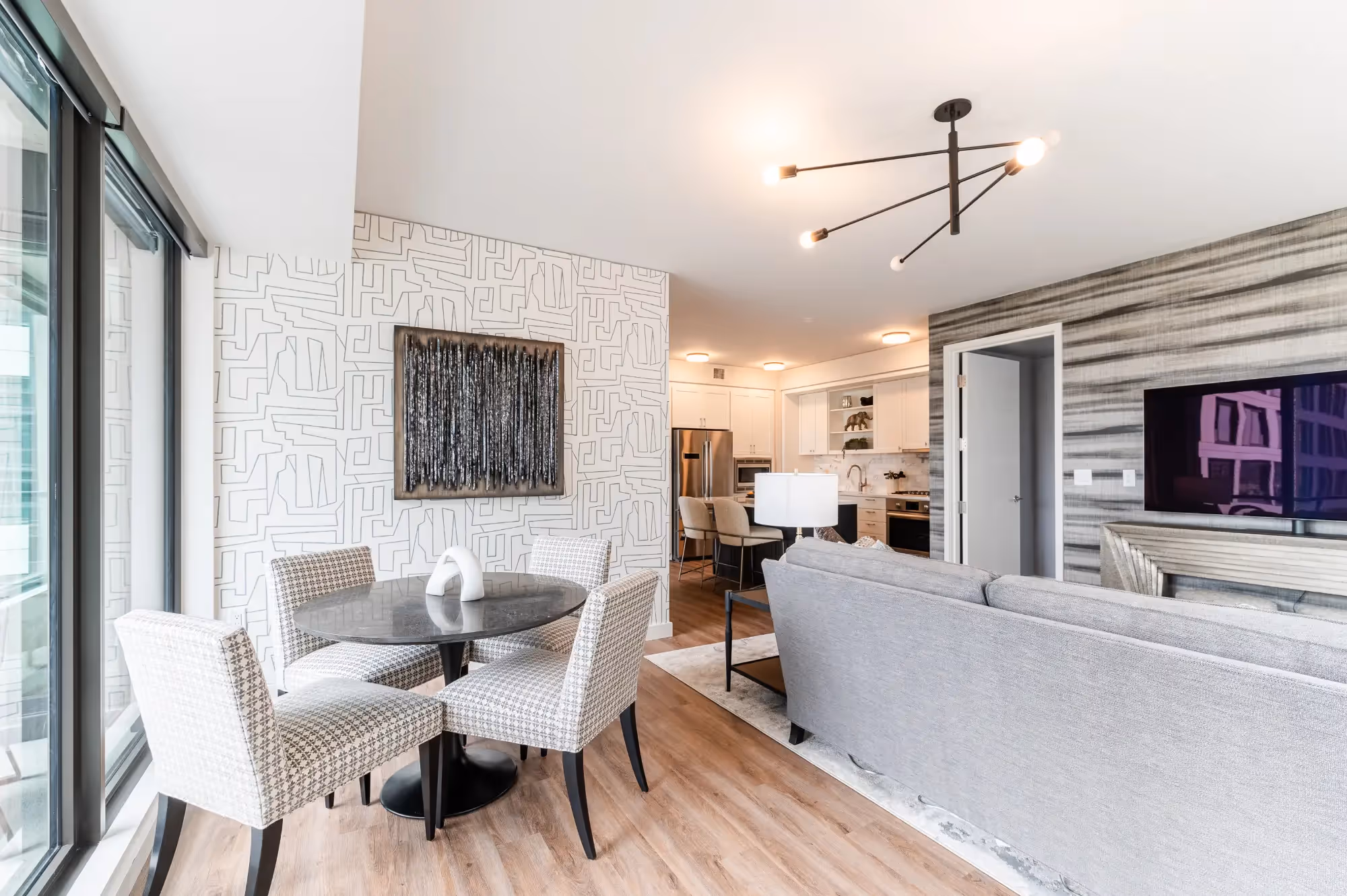 Urban condo design at The Coloradan with layered textures, custom closets, and bold wallcoverings throughout.