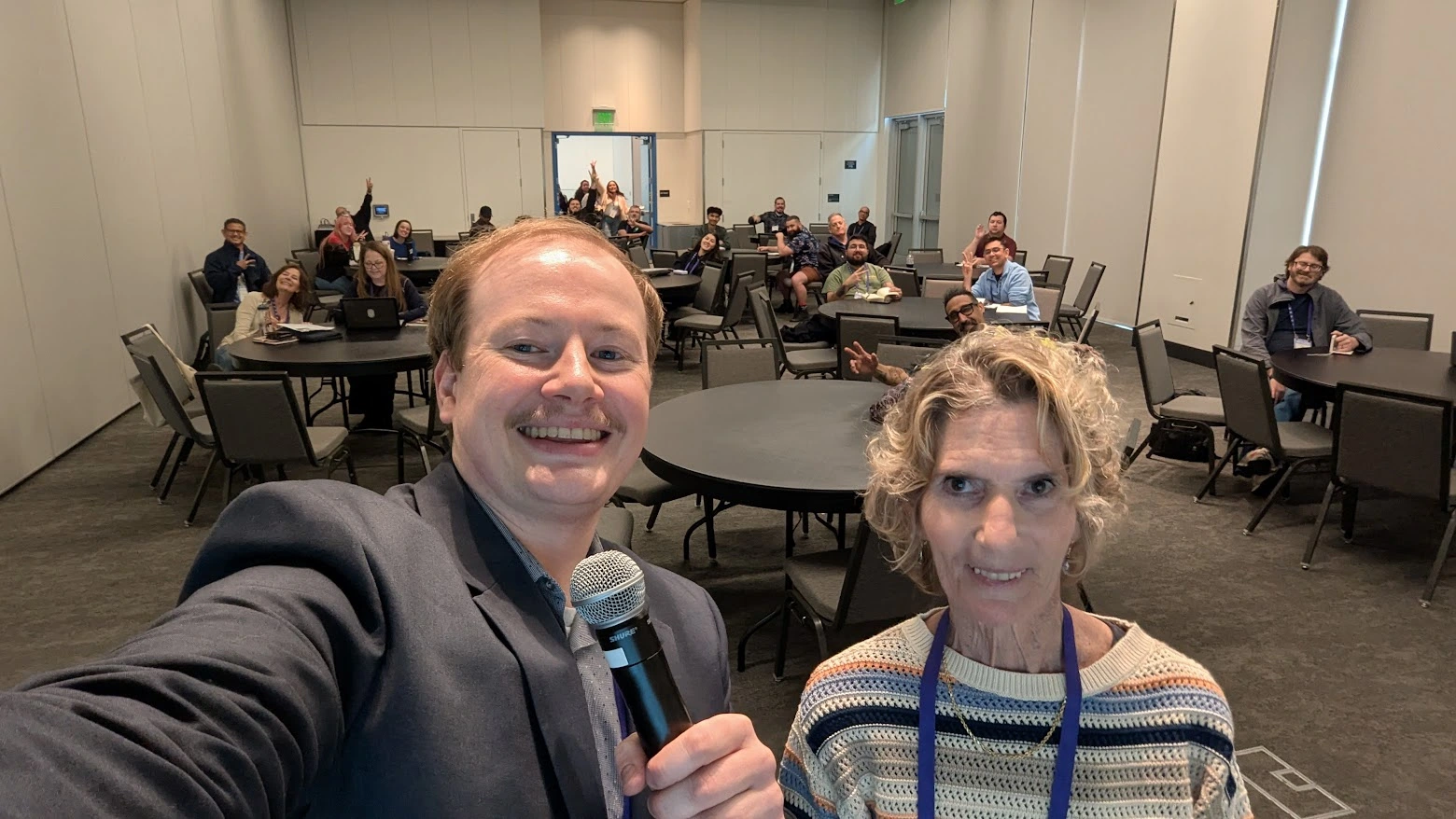 Peter Polygalov and Jill Ranucci co-presenting on CTE career pathways at a K-12 education conference