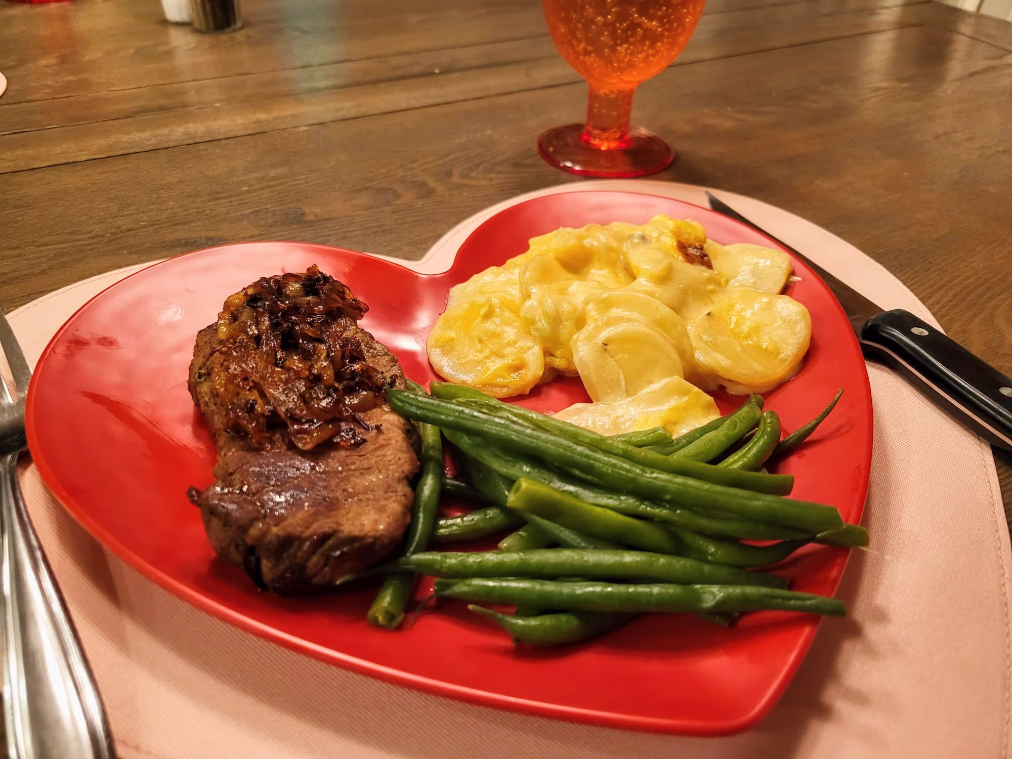 Steak with Cannabis Infused Caramelized Onions