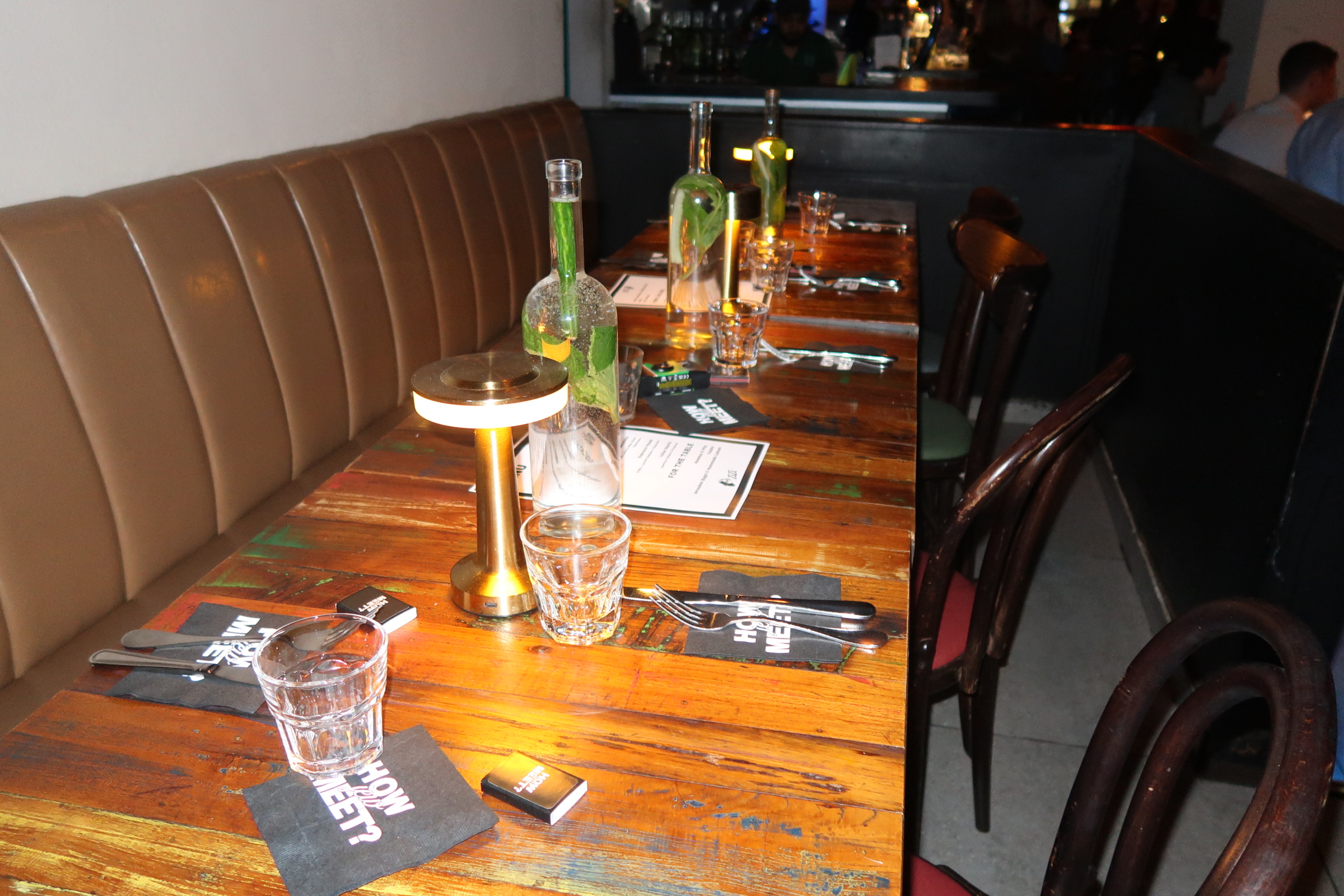 A How Jew Meet dinner table full of friends at a New York restaurant