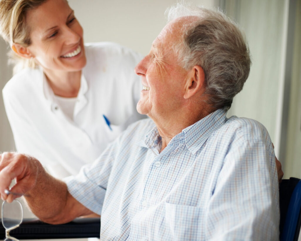 Skilled Nurse attending to a senior at Vinson Hall, McLean
